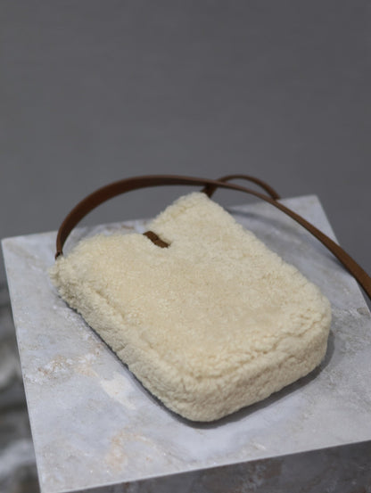 SAINT LAURENT LE 5 À 7 HOBO BAG 18 IN CREAM SHEARLING AND BROWN SUEDE TRIM
