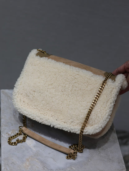 SAINT LAURENT NIKI SMALL 22 IN CAMEL SUEDE AND WHITE SHEARLING