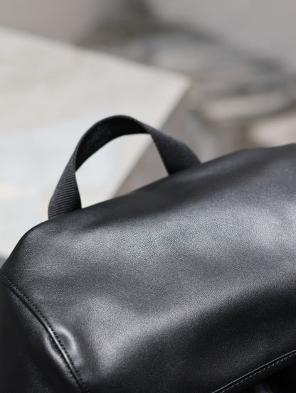 SAINT LAURENT BACKPACK 45 IN BLACK CALFSKIN WITH EMBOSSED LOGO
