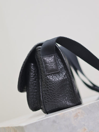 SAINT LAURENT NIKI BABY 22 IN BLACK ELEPHANT PATTERN LAMBSKIN SILVER LOGO