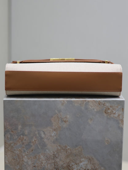 SAINT LAURENT MANHATTAN MEDIUM 29 IN WHITE CANVAS AND BROWN CALFSKIN GOLD BUCKLE