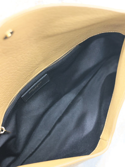SAINT LAURENT ENVELOPE CLUTCH 29 IN EARTHY YELLOW LAMBSKIN COPPER LOGO