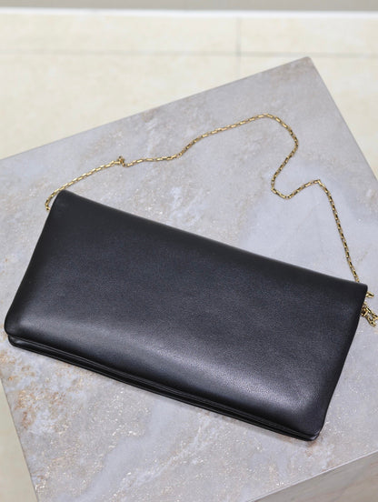SAINT LAURENT CALYPSO POUCH 24 IN BLACK LAMBSKIN GOLD LOGO