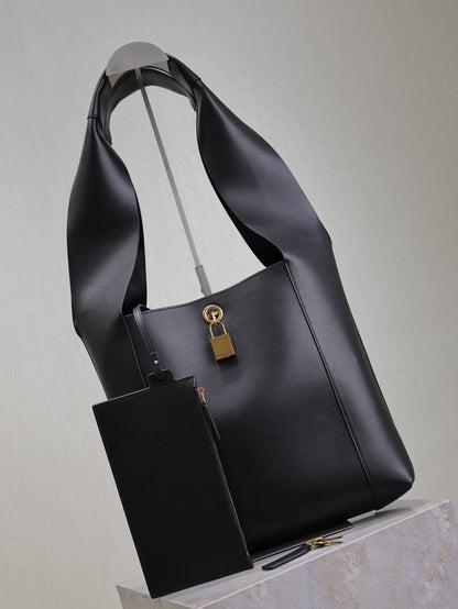 SAINT LAURENT TANGER HOBO BAG 27 IN BLACK CALFSKIN