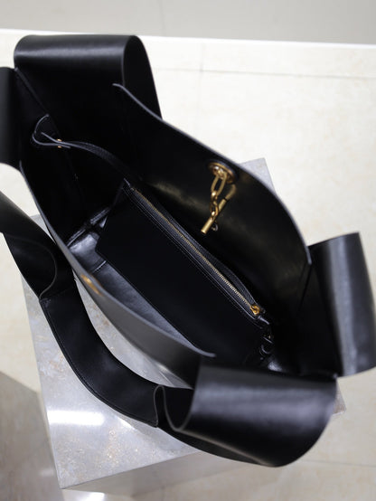 SAINT LAURENT TANGER HOBO BAG 27 IN BLACK CALFSKIN