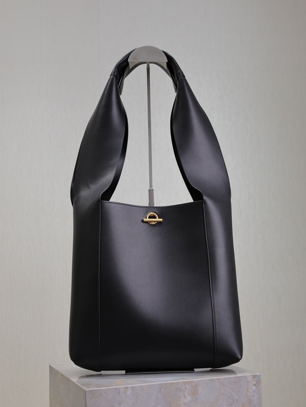 SAINT LAURENT TANGER HOBO BAG 27 IN BLACK CALFSKIN
