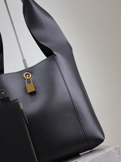 SAINT LAURENT TANGER HOBO BAG 27 IN BLACK CALFSKIN